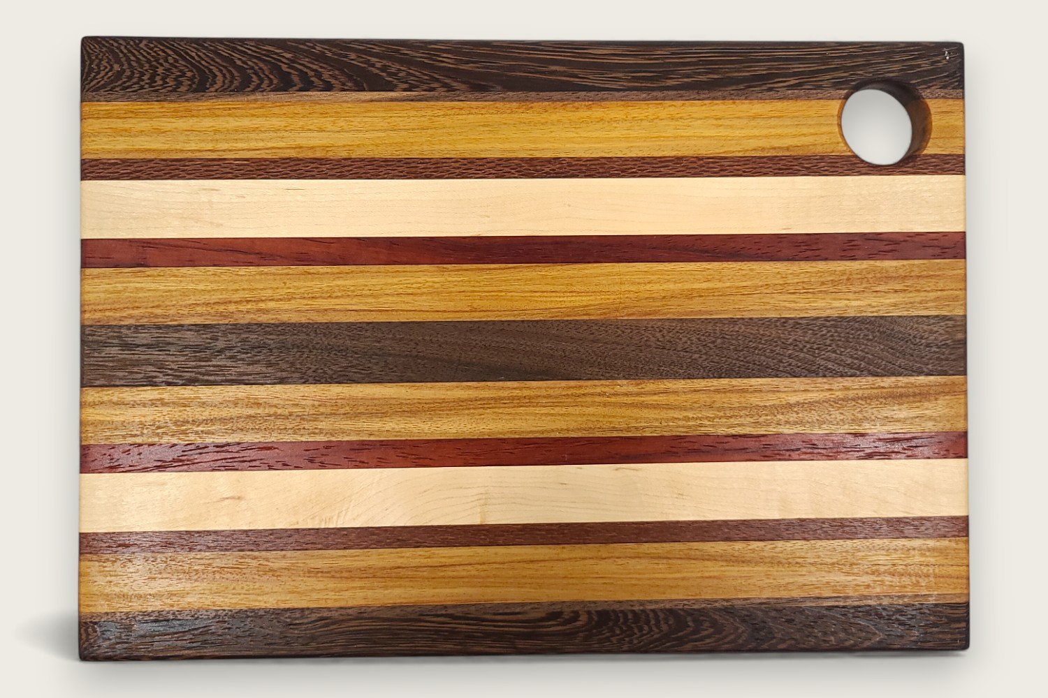 Chesapeake Harvest Prep Board (#165) made of Canarywood with edge-grain pattern, rectangular shape, and warm tones.